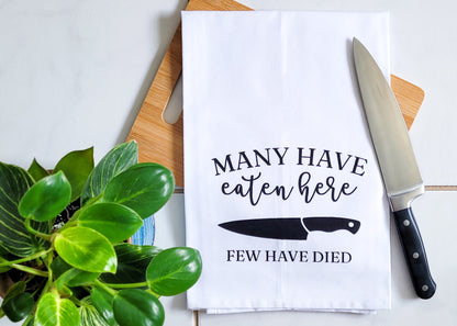 Many Have Eaten Here, Few Have Died Tea Towel - White