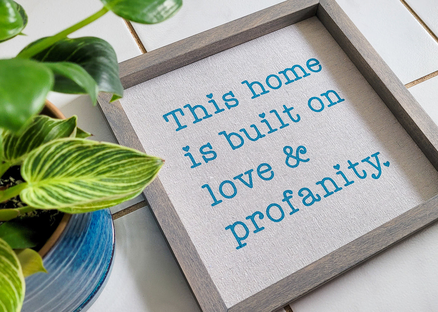 This Home is Build on Love & Profanity Sign with Weathered Gray Frame and Turquoise Ink