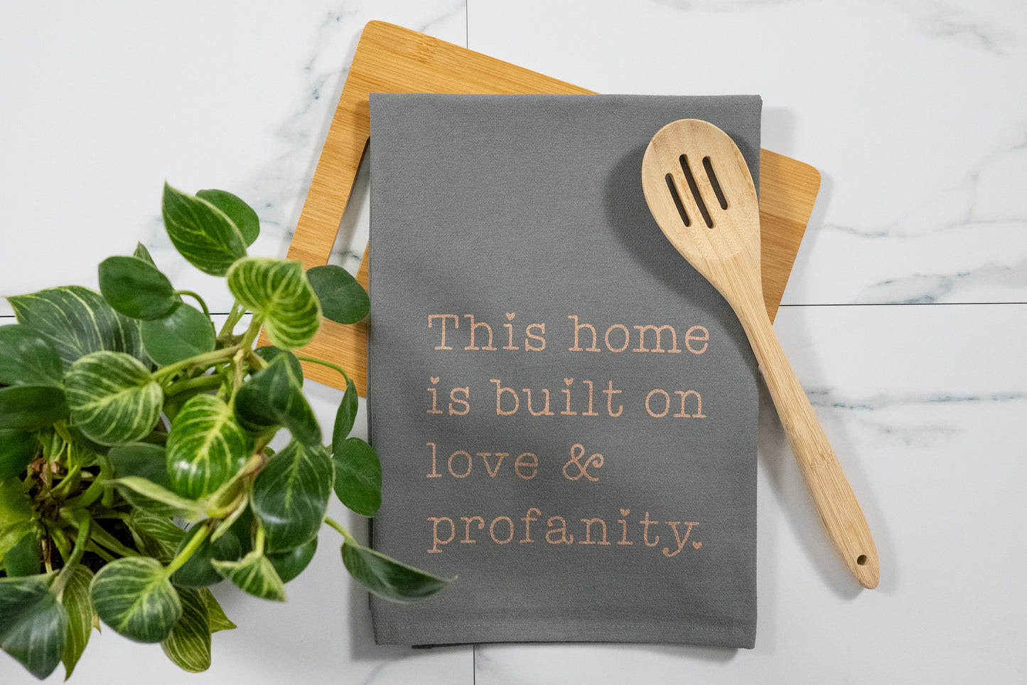 This Home Is Built On Love & Profanity Gray Tea Towel with Rose Gold Ink
