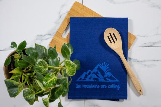 The Mountains Are Calling Blue Tea Towel with Electric Blue Ink