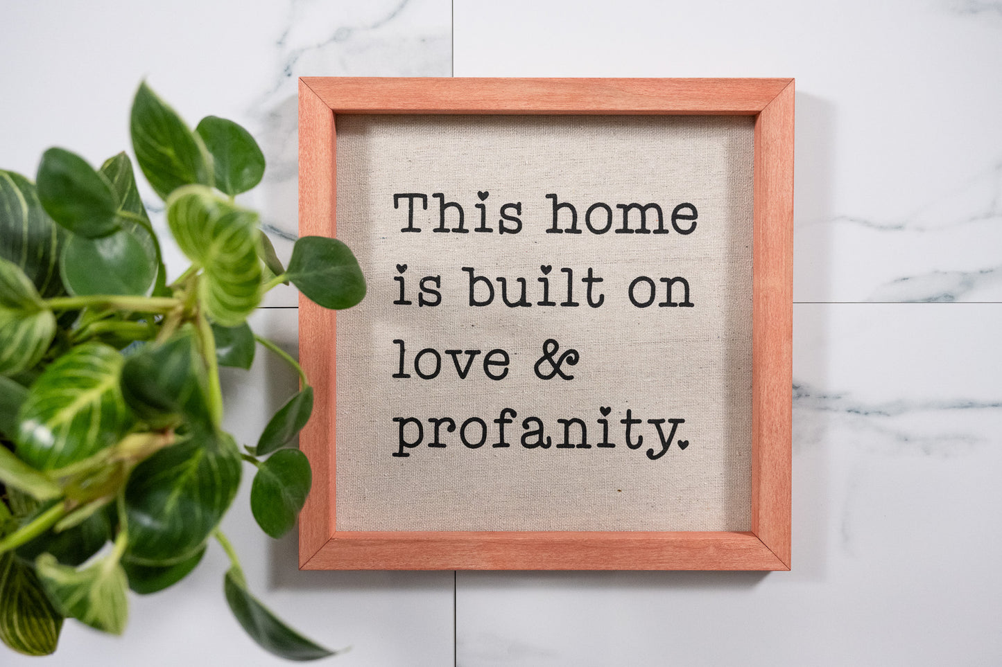 This Home is Build on Love & Profanity Sign with Apple Pie Frame and Black Ink