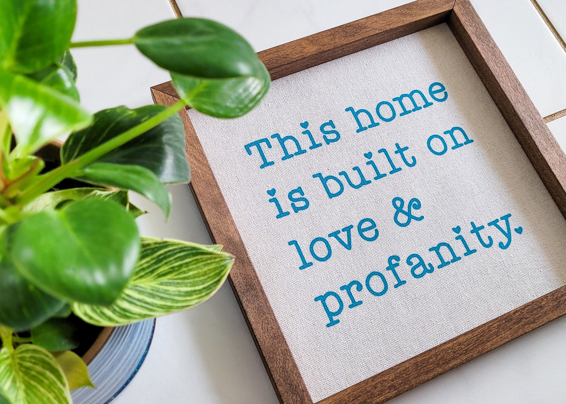 This Home is Build on Love & Profanity Sign with Walnut Frame and Turquoise Ink