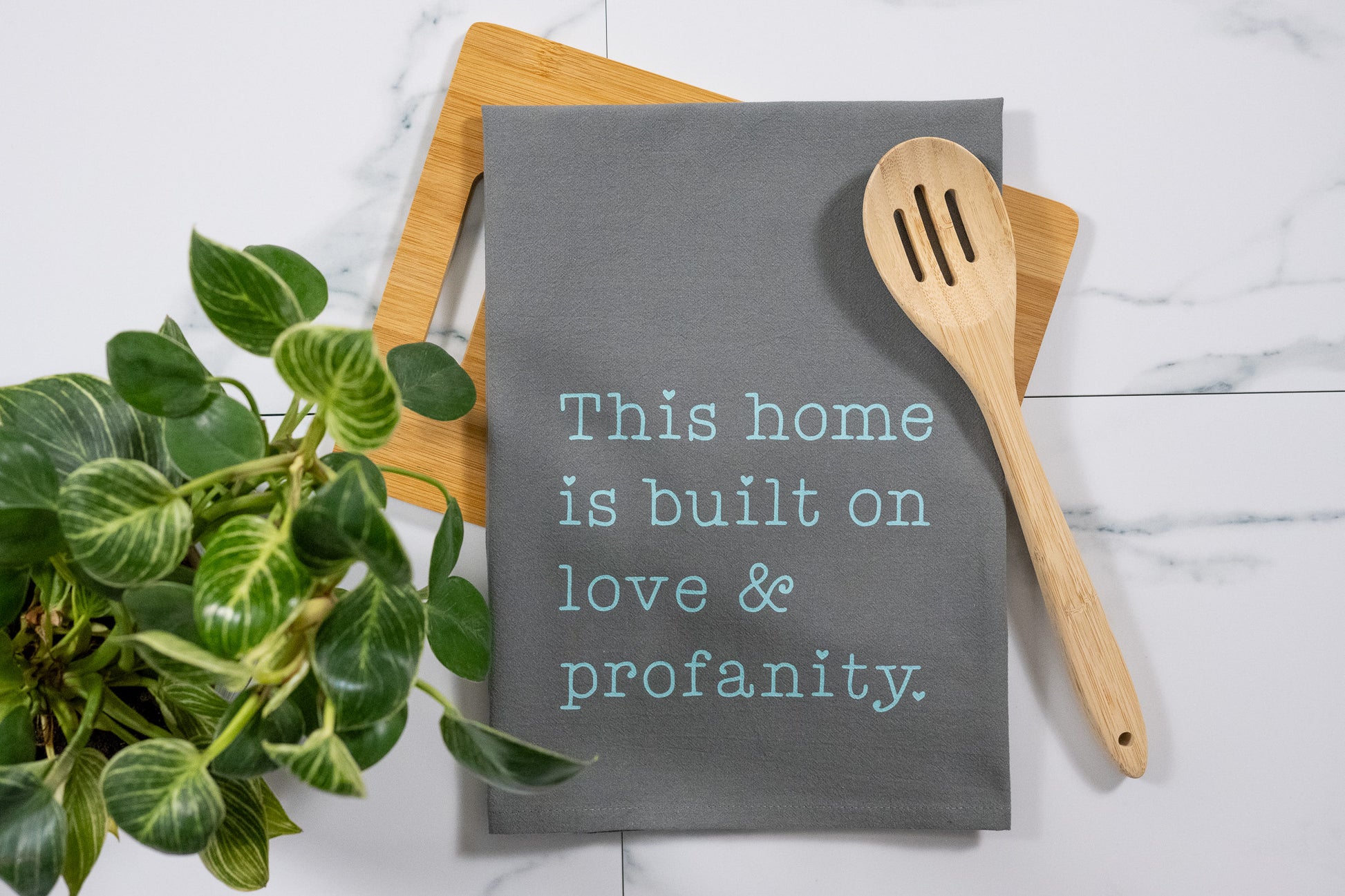 This Home Is Built On Love & Profanity Gray Tea Towel with Mint Ink