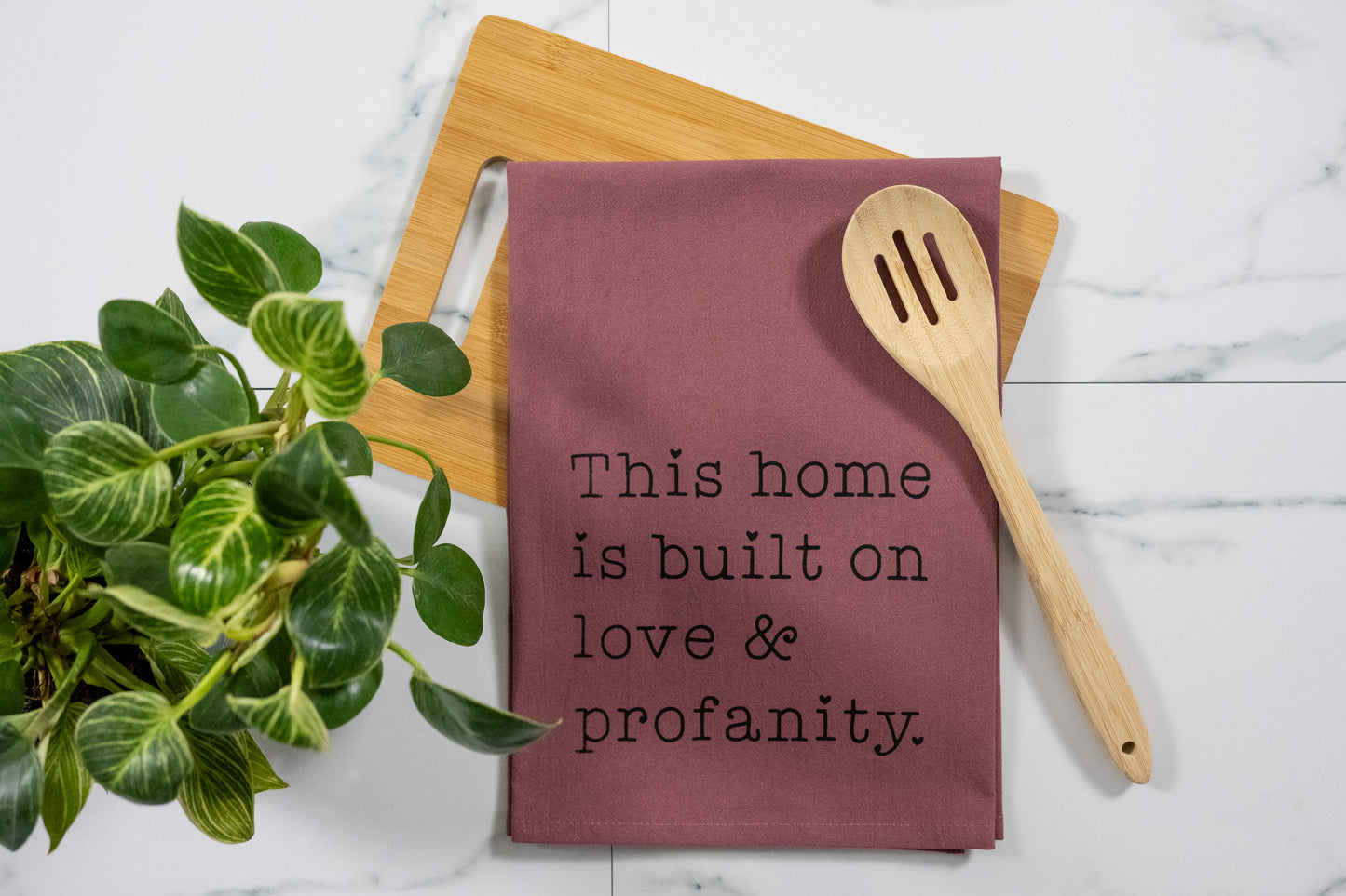 This Home Is Built On Love & Profanity Wine Tea Towel with Black Ink