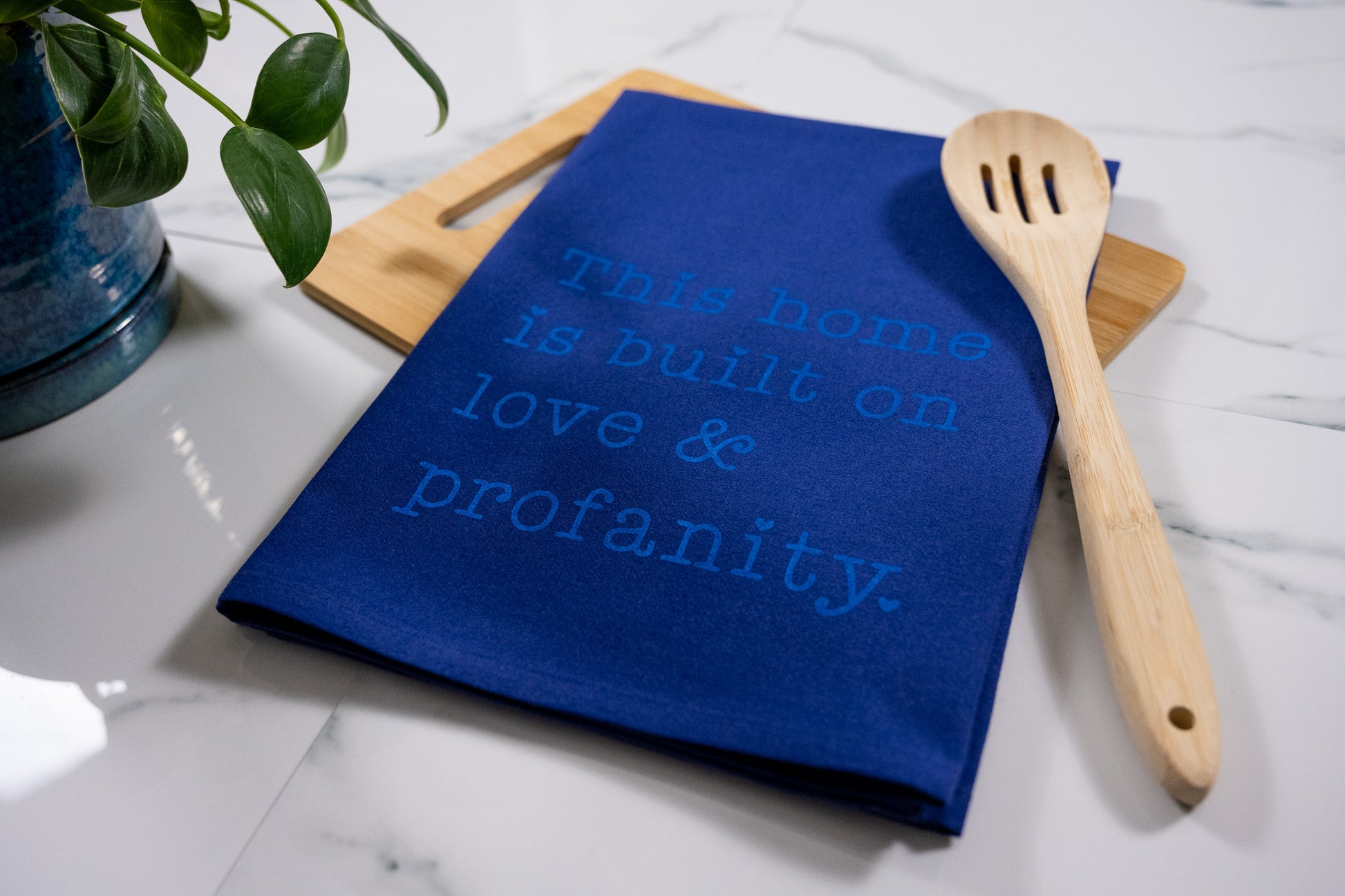 This Home Is Built On Love & Profanity Blue Tea Towel with Electric Blue Ink