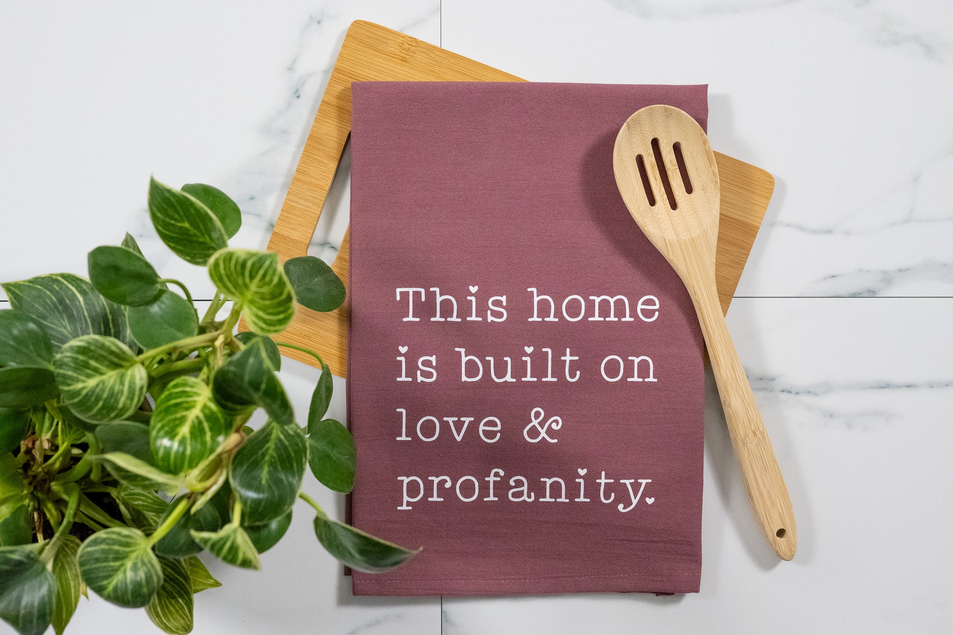 This Home Is Built On Love & Profanity Wine Tea Towel with White Ink