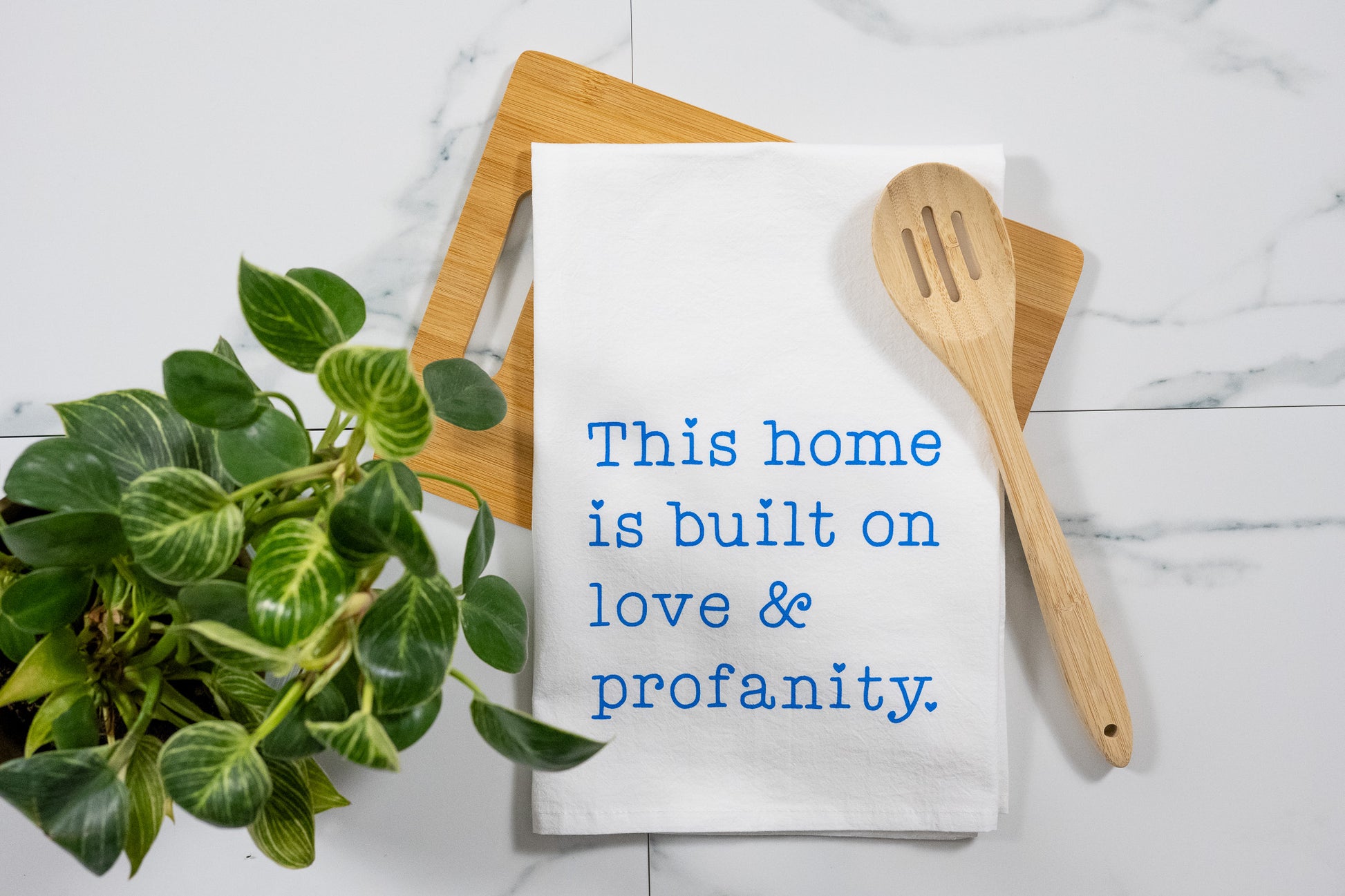 This Home Is Built On Love & Profanity White Tea Towel with Electric Blue Ink