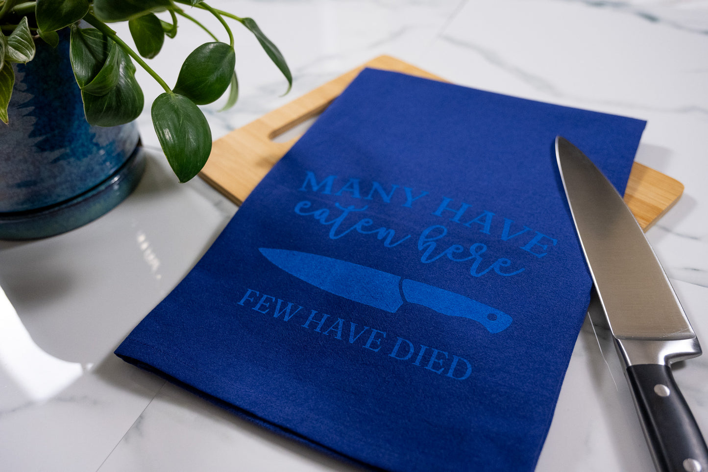 Many Have Eaten Here, Few Have Died Blue Towel with Electric Blue Ink