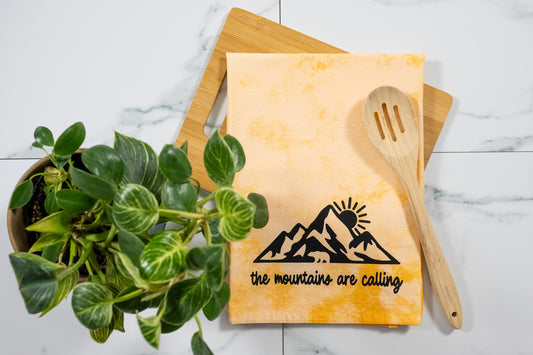 The Mountains Are Calling Orange Tie-Dye Tea Towel with Black Ink