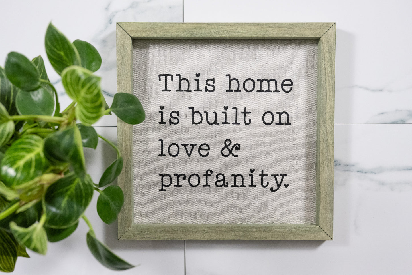 This Home is Build on Love & Profanity Sign with National Park Frame and Black Ink