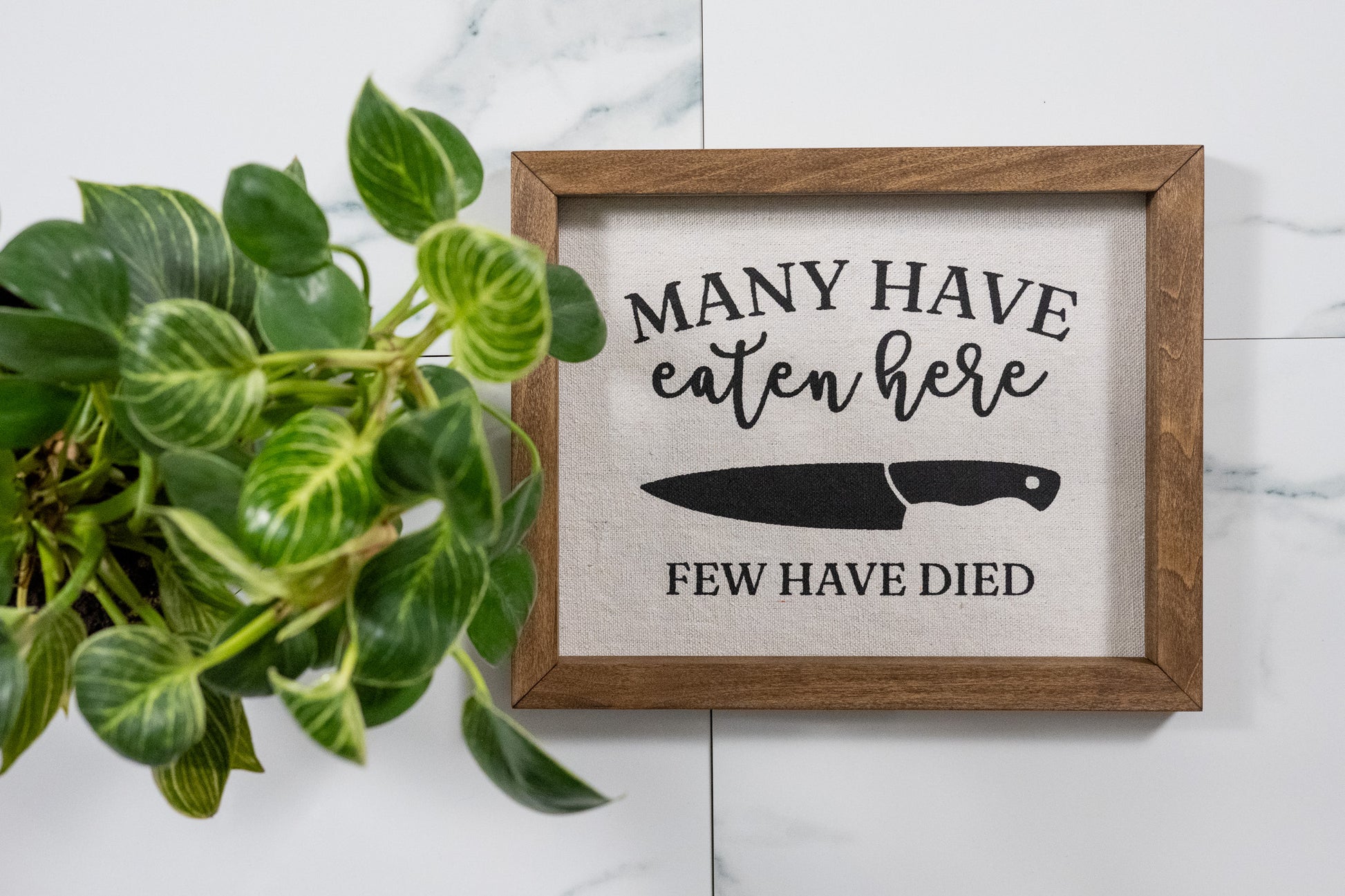 Many Have Eaten Here, Few Have Died Sign with Walnut Frame and Black Ink